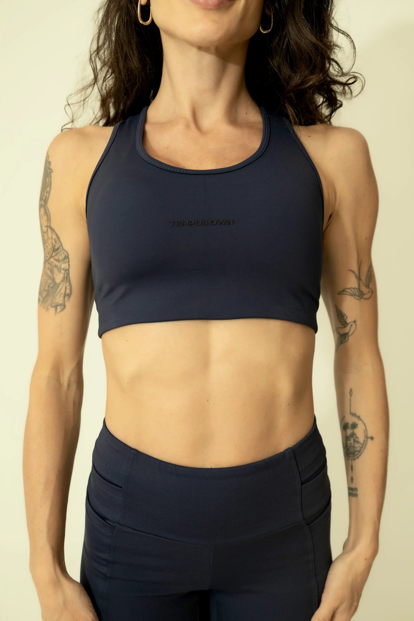 Front view of the Deep Blue high-impact running sports bra by Tempus Own, highlighting the supportive athletic fit and premium smooth Emana fabric.