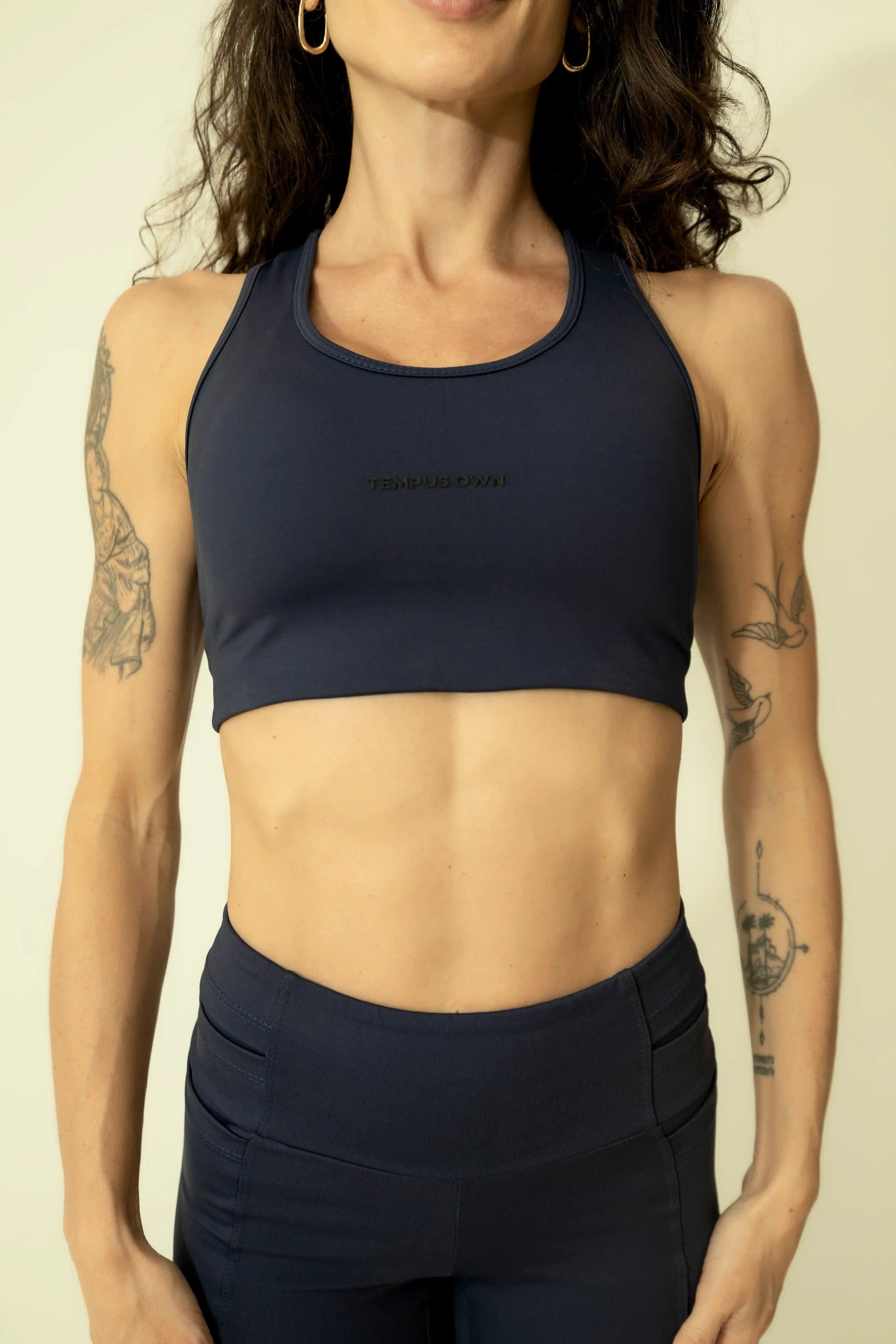 Front view of the Deep Blue high-impact running sports bra by Tempus Own, highlighting the supportive athletic fit and premium smooth Emana fabric.