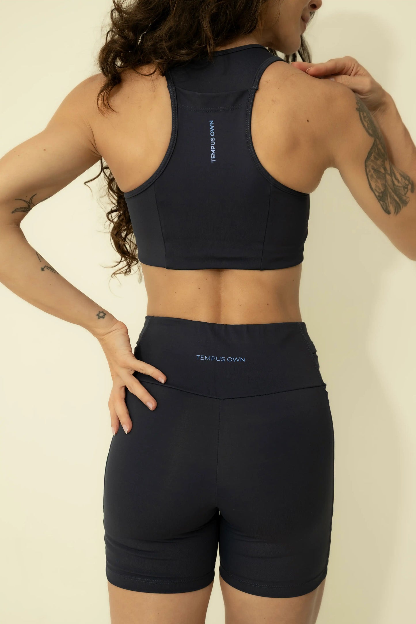 Detailed back view of the Deep Blue running sports bra, featuring a racerback design for maximum shoulder mobility and athletic support.